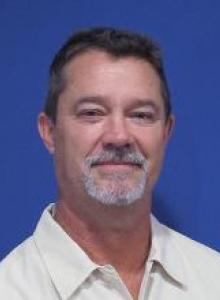 DANIEL L. MILLER